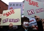 Former N.Korean refugees demonstrate outside Chinese Embassy in Seoul, Korea Demonstrators against forcible repatriation of NK refugees in China (Associated Press photo)