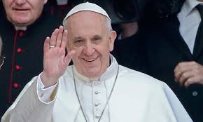 Pope Francis waving to one of many crowds